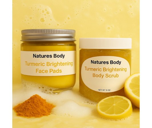 Two jars of Natures Body Turmeric Brightening Face Pads and Body Scrub on a yellow background with turmeric powder and lemon slices.